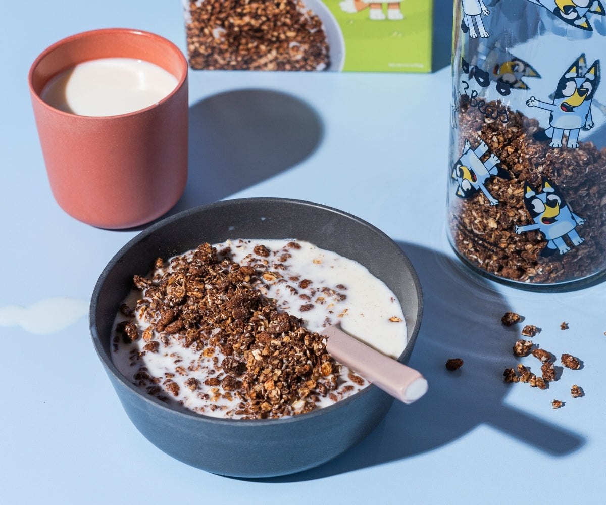 Cocoa crunchy muesli with milk in a bowl