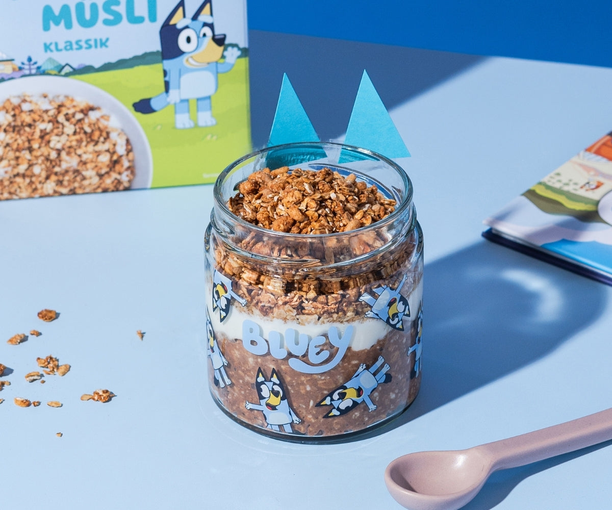 Classic crunchy muesli with milk in a glass